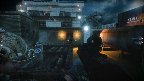 Run behind your companions on the big red hatch, covered with a lot of boxes and hide behind them, at which hide in one of the allies - Mission 12: Bump in the Night - Campaign - Medal of Honor: Warfighter - Game Guide and Walkthrough