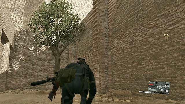 A ladder, leading to the upper walls of the base. - Reaching Skull Face - Mission 30 - Skull Face - Metal Gear Solid V: The Phantom Pain - Game Guide and Walkthrough