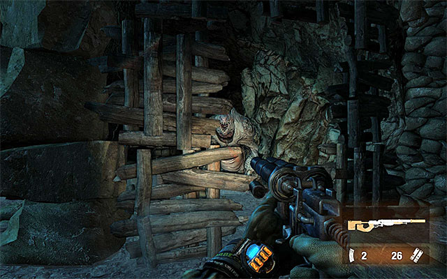 Phase two of the encounter is very similar to the previous instance so, you need to position yourself near the columns and wooden barricades to encourage the monster, in a way, to charge at you and take damage as a result of ramming into the obstacles - Follow the catacombs towards Oktyabrskaya - Chapter 18: Undercity - Metro: Last Light - Game Guide and Walkthrough