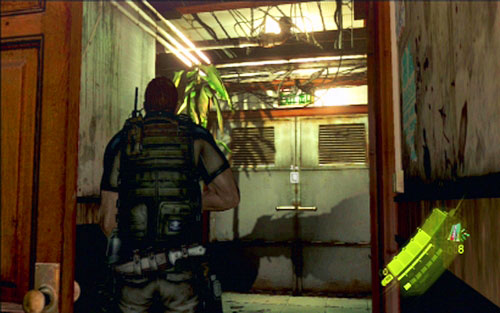 When the area is clear, go through the wide door on the other side of the corridor - Chapter 1 - City Alleys - Chris's campaign - Resident Evil 6 - Game Guide and Walkthrough