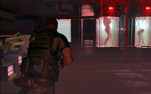 Behind next door you'll find a laboratory with large water containers and an elevator - Chapter 3 - The Secret Lab - Chris's campaign - Resident Evil 6 - Game Guide and Walkthrough