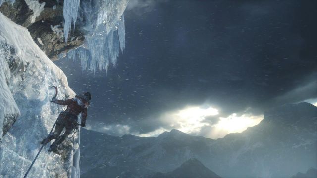 Perform another long jump right after another cutscene and quickly press the X button so that Lara will stick the axe into the ice wall on the other side - Siberia - Climb on the mountain top - Walkthrough - Rise of the Tomb Raider - Game Guide and Walkthrough