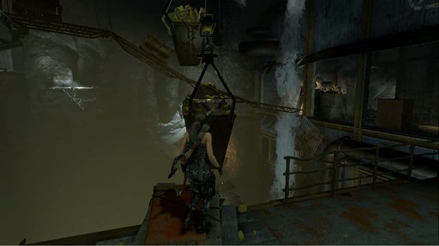 Hang down from the container to lower the cart. - Tomb 1 - Red Mines - Soviet Installation - Rise of the Tomb Raider - Game Guide and Walkthrough