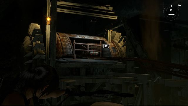 In the spot shown in the screenshot, you can attach a rope and release the cart - Tomb 1 - Red Mines - Soviet Installation - Rise of the Tomb Raider - Game Guide and Walkthrough