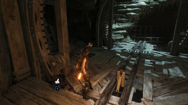 In the location of the second cart (tomb Pit of Judgment), climb to the upper part of the scaffolding and you find the cache by the wall - Survival caches - Geothermal Valley - Rise of the Tomb Raider - Game Guide and Walkthrough