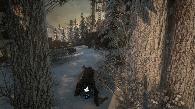 In the forest, past the skating rink, close to the vehicles at the edge, at the tree - Survival Caches - Research Base - Rise of the Tomb Raider - Game Guide and Walkthrough