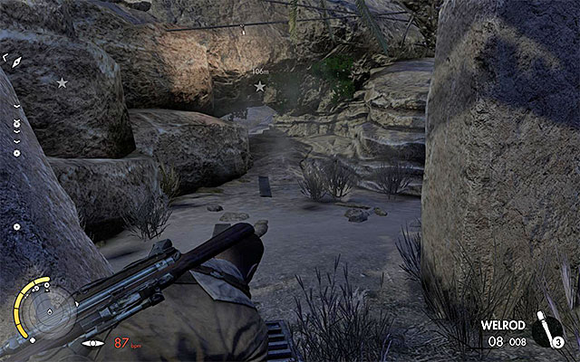 A narrow passage, requiring you to lie on the ground. - Eliminating the second enemy officer - Mission 2 - Gaberoun - Sniper Elite III: Afrika - Game Guide and Walkthrough
