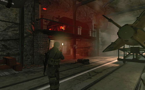 Head to the other side of the tunnel, towards the place where you have to plant the last explosive charge [#9] - Mission 2 - Mittelwerk Facility - p. 2 - Walkthrough - Sniper Elite V2 - Game Guide and Walkthrough