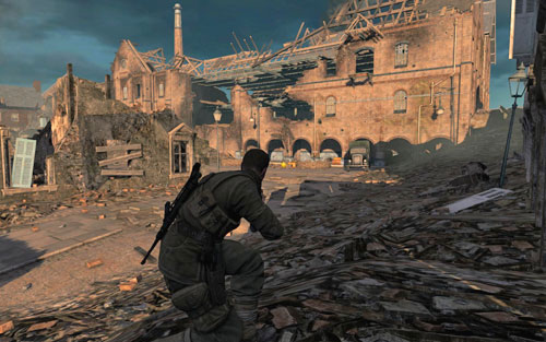 In a matter of seconds the opposite buildings will get filled by Russians - pay attention to the destroyed wall of the upper floor as well as the main entrance, where there are two machine gun posts - Mission 7 - Karlshorst Command Post - p. 1 - Walkthrough - Sniper Elite V2 - Game Guide and Walkthrough