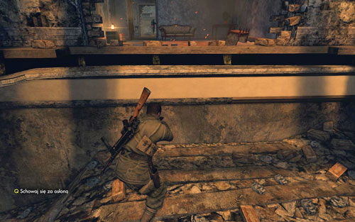 Go up the rubble, climb onto the upper floor and when the German will be facing the other direction - send him a bullet into the head - Mission 10 - Brandenburg Gate - p. 1 - Walkthrough - Sniper Elite V2 - Game Guide and Walkthrough