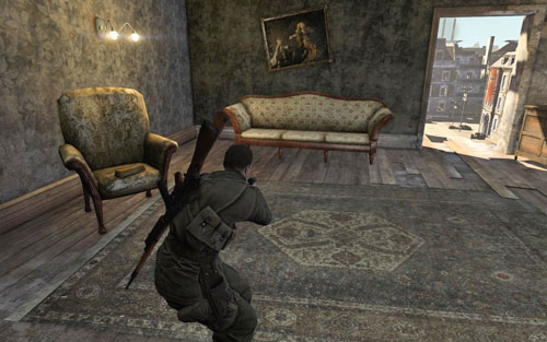 The gold is on a chair in the room on the left, at the very top of the building [#9] which you will enter after planting the charges - Mission 1 - Wine Bottles and Gold Bars - Sniper Elite V2 - Game Guide and Walkthrough