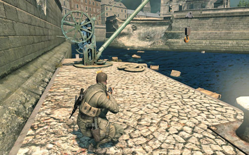 By the crane on the other side of the bridge [#8] - as you evacuate from the museum - Mission 3 - Wine Bottles and Gold Bars - Sniper Elite V2 - Game Guide and Walkthrough