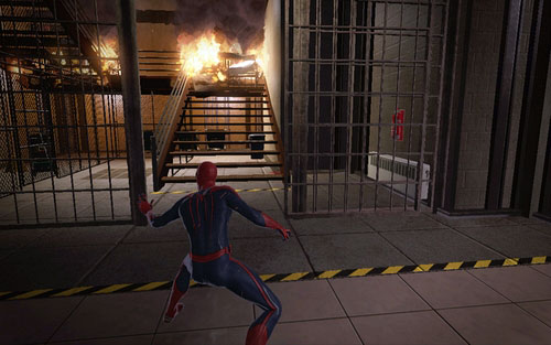 Run forward and you will reach a burning staircase - Chapter 02 - Escape Impossible - Walkthrough - The Amazing Spider-Man - Game Guide and Walkthrough