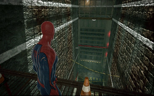 With the area clear, approach the big pit - Chapter 04 - The Thrill of the Hunt - p. 1 - Walkthrough - The Amazing Spider-Man - Game Guide and Walkthrough
