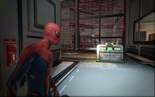 Behind the corridor with a big window you should see a wall of red laser - Chapter 06 - Smythe Strikes Back - p. 1 - Walkthrough - The Amazing Spider-Man - Game Guide and Walkthrough