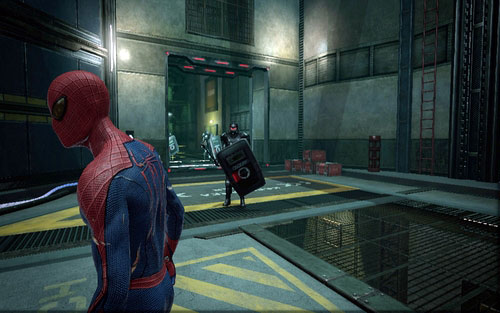 Below, you will have to fight a big group of enemies with shields - Chapter 07 - Spidey to the Rescue - Walkthrough - The Amazing Spider-Man - Game Guide and Walkthrough