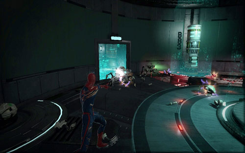 In order to free him, shoot web at incoming robots and then throw them into the nearby field generators (hold down B and aim with the analog stick) - Chapter 10 - Spider-Man No More! - p. 1 - Walkthrough - The Amazing Spider-Man - Game Guide and Walkthrough