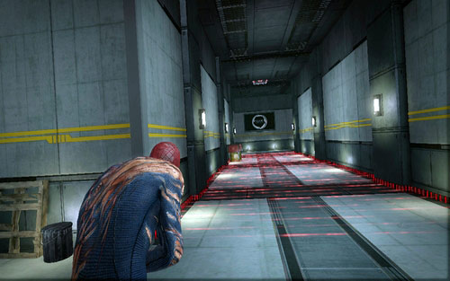 The further road leads through red lasers and turrets which react to them - Chapter 10 - Spider-Man No More! - p. 2 - Walkthrough - The Amazing Spider-Man - Game Guide and Walkthrough
