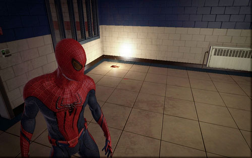 To the left behind the man you should find the second magazine - Chapter 02 - Escape Impossible - Collectibles inside buildings - The Amazing Spider-Man - Game Guide and Walkthrough