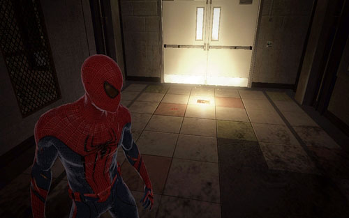 However before you jump down, go through the burning barricade on the right - Chapter 02 - Escape Impossible - Collectibles inside buildings - The Amazing Spider-Man - Game Guide and Walkthrough