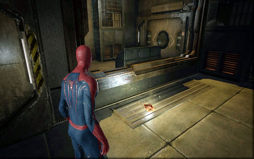 Lying by the wall on the left - Chapter 03 - In the Shadow of Evils Past - p. 1 - Collectibles inside buildings - The Amazing Spider-Man - Game Guide and Walkthrough