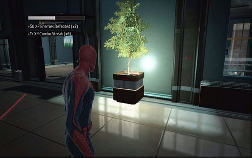 After defeating the first group of enemies and opening the door, jump onto the higher floor - Chapter 07 - Spidey to the Rescue - p. 1 - Collectibles inside buildings - The Amazing Spider-Man - Game Guide and Walkthrough