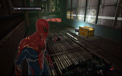 It's lying nearby the red lasers - Chapter 07 - Spidey to the Rescue - p. 2 - Collectibles inside buildings - The Amazing Spider-Man - Game Guide and Walkthrough