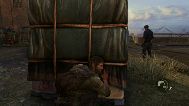 To eliminate the remaining enemies, take cover behind the cargo crate and wait for the two soldiers to turn away from you - The Cargo (text & map) - The Quarantine Zone - The Last of Us - Game Guide and Walkthrough