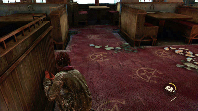 It is not difficult to sneak up to the man but, you need to watch out for the crockery fragments on the floor - Cabin Resort - Lakeside Resort - The Last of Us - Game Guide and Walkthrough