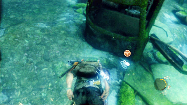 You should notice a car wreck in the right corner, with the pendant next to it, under the water - The Suburbs - Sewer - Artifacts and pendants - The Last of Us - Game Guide and Walkthrough