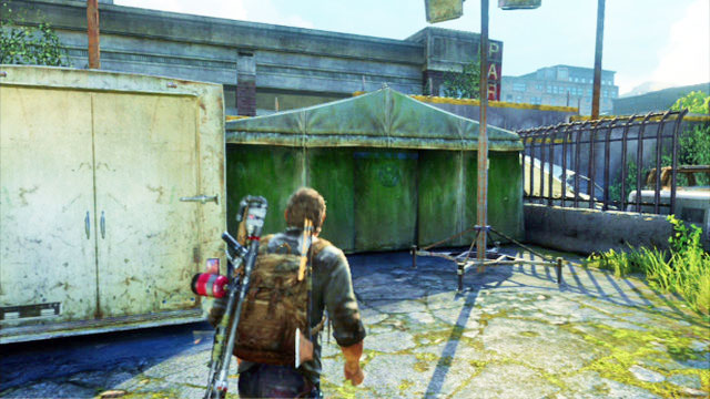 While on the platform, search for a small green tent - Bus Depot - Artifacts and pendants - The Last of Us - Game Guide and Walkthrough