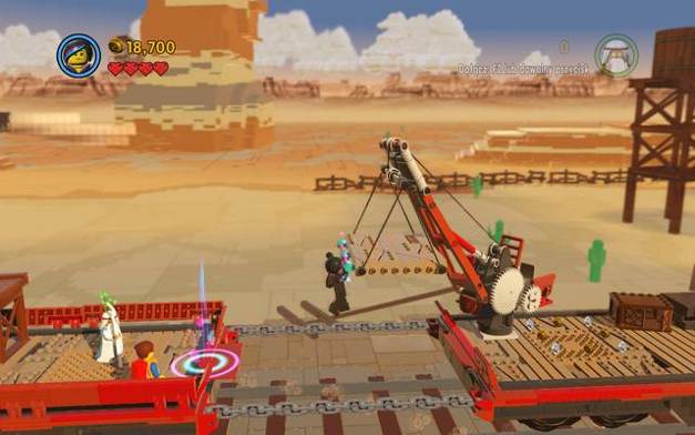 Make it over to the crane and lead your companions through - Old West - The story mode - The LEGO Movie Videogame - Game Guide and Walkthrough