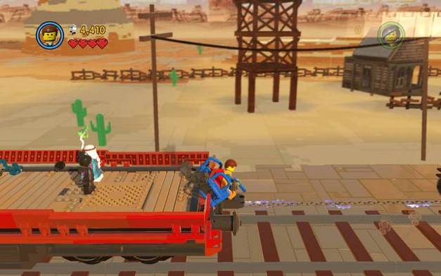 Fix the link between the railway cars - Old West - The story mode - The LEGO Movie Videogame - Game Guide and Walkthrough