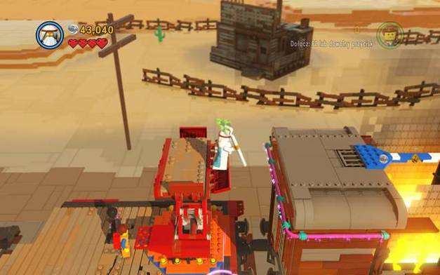 Jump up and walk over the blue beam - Old West - The story mode - The LEGO Movie Videogame - Game Guide and Walkthrough