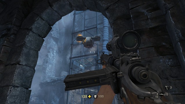After killing the supersoldier in your way and eliminating the commander, go under the arcades and keep destroying combat drones on your way to the elevator - Chapter 4 - Escape! - Walkthrough - Wolfenstein: The Old Blood - Game Guide and Walkthrough