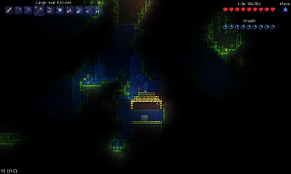 My character finding a treasure in a jungle underground, in Terraria.