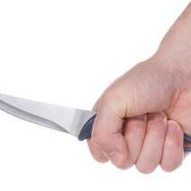  A hand holding a knife