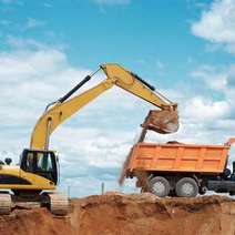  An excavator and a lorry