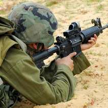  A soldier aiming with gun