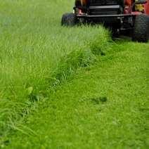 Large grass lawn being cut