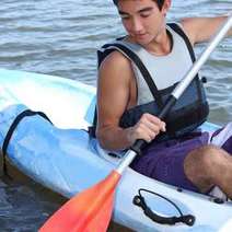 Man paddling on a boat