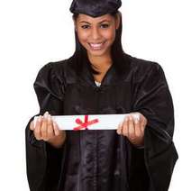 Graduate holding a diploma