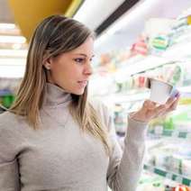 Woman buying a yoghurt
