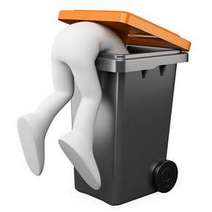 White figure sticked in a garbage bin