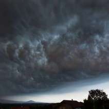  Black clouds over the land