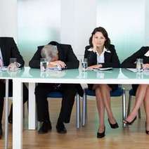  A man sleeping on a business meeting