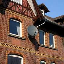  A brick house with a satellite antenna