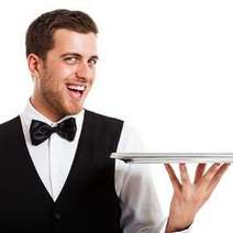 A waiter holding a tray 