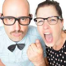 Couple wearing glasses, woman screaming 