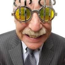 An old man with dollars on his glasses 